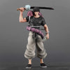 A figurine of Suguru Geto from Jujutsu Kaisen, holding a large sword and wearing dark clothing.