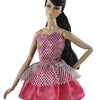 A female doll wearing a pink and silver mesh dress gown.