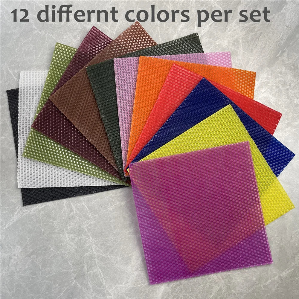 A collection of twelve different colored honeycomb beeswax candle DIY kits arranged in a fan shape.