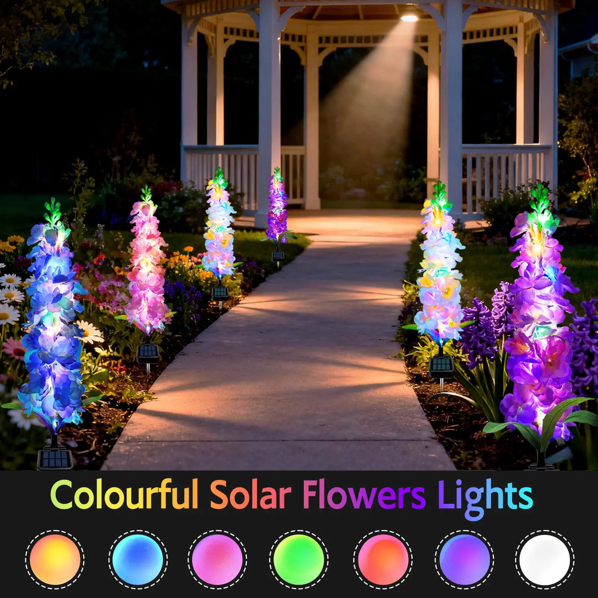 A row of colorful solar flowers lights illuminating a pathway between pillars in a garden setting.