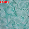 Light blue silk rose petals used for weddings and events