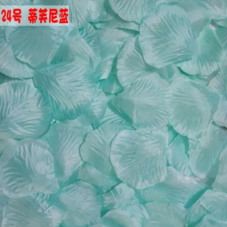 Light blue silk rose petals used for weddings and events