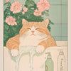 A fluffy orange cat is relaxing on a windowsill, with a bottle of facial cleanser in the foreground.