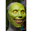 A green latex mask resembling a grotesque face with yellow eyes and a stitched mouth, displayed on a mannequin head.