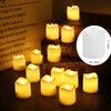 A collection of glowing, warm white LED tealight candles placed on a stack of dark books.