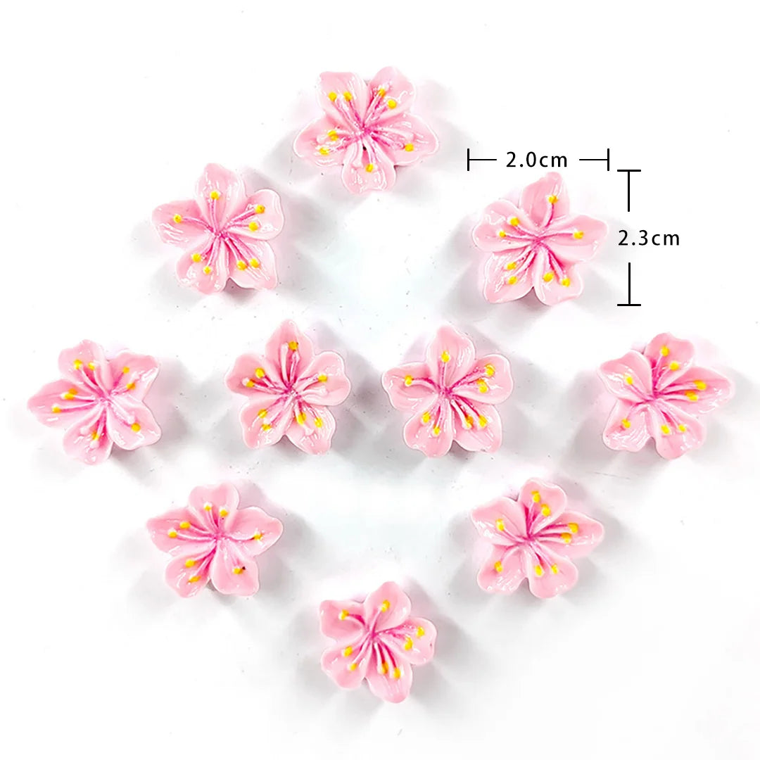 Un juego de imanes florales rosas y amarillos para nevera, con dimensiones de 2.0cm y 2.3cm.
