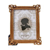 An elegant gold-framed photo frame with a white background and vintage lace pattern.