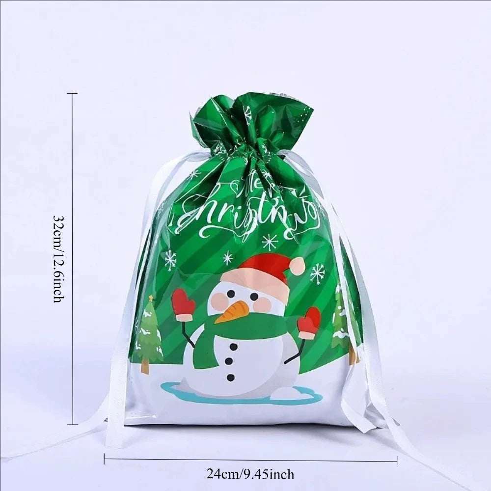 Reusable green and white drawstring gift bag with a festive snowflake design