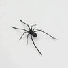 A black magnetic acrylic cat whiskers decor with long, thin legs.