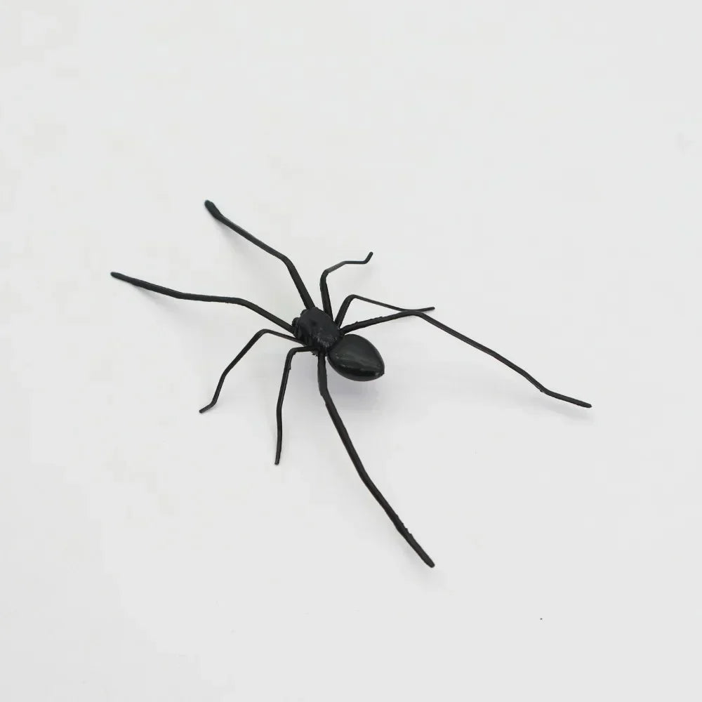 A black magnetic acrylic cat whiskers decor with long, thin legs.