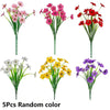 Five bouquets of artificial flowers in random colors including pink red and yellow