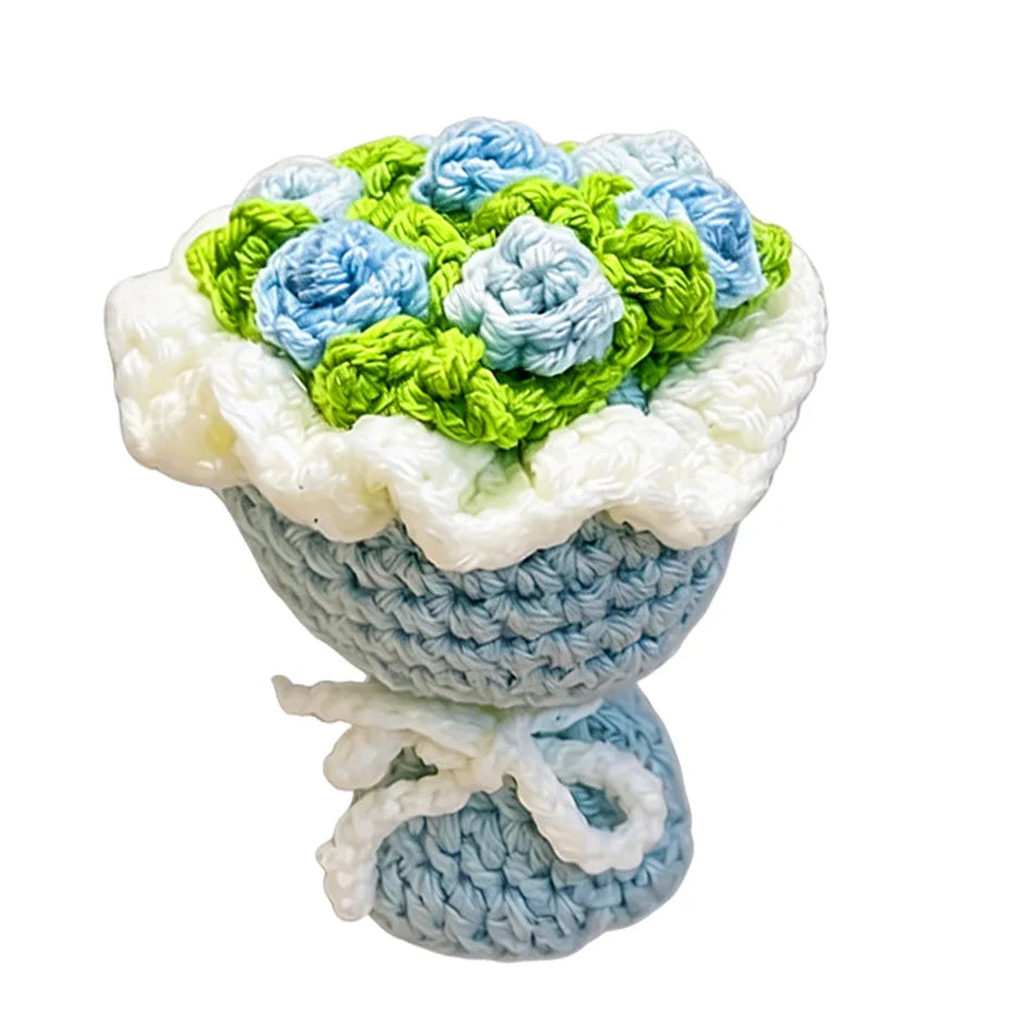 Handmade crochet flower bouquet keychain featuring blue and green flowers in a light blue base