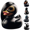 A set of seven black rubber duck figurines featuring gothic punk designs and various expressions.