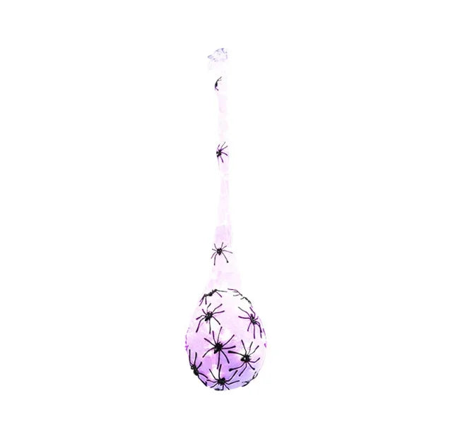 A purple Halloween glowing spider web decoration with light-up eggs.