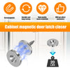A close-up of a heavy duty metal cabinet door magnetic latch closer demonstrating its function on a white cabinet door.