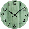 A minimalist wooden wall clock with a green weathered wood background and black hands.