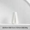 White hand-frosted ceramic tabletop vase, 9cm high, 4cm diameter, weighing 260g.