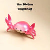 Pink crab-shaped desk organizer with pen and phone holder
