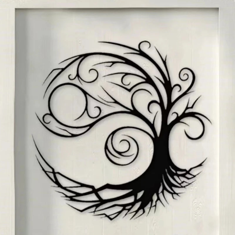 Black silhouette of a stylized tree with intricate branches and swirling leaves on a white wall.