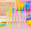 Collection de petits tubes de bulles mignons pour fêtes, dans des couleurs pastel comme le vert, le jaune, le bleu et le rose