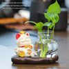 Mini resin desk ornament featuring a lucky cat figurine and green ivy plant in a glass vase