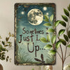 Vintage metal wall decor featuring a quote about the moon and dragonfly on a teal background