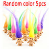 Five mini retro troll doll figures with random bright colors standing in a row.