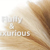 Close-up of fluffy, light blonde faux pampas grass floral decor.