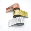 Three rolls of 3D mirror mosaic wall tiles in rose gold, gold, and silver, displayed diagonally.