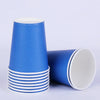 A stack of blue disposable cups and a single cup are shown against a white background.