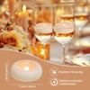 A set of realistic flickering LED floating candles in glass holders with batteries included