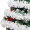 A close-up of a Christmas tree decorated with white tinsel ribbon garland and red berries.