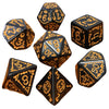 A set of seven polyhedral dice in dark wood and gold accents, displayed at various angles.