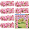 A close-up display of artificial silk pink and light pink rose flower panels for weddings and events.