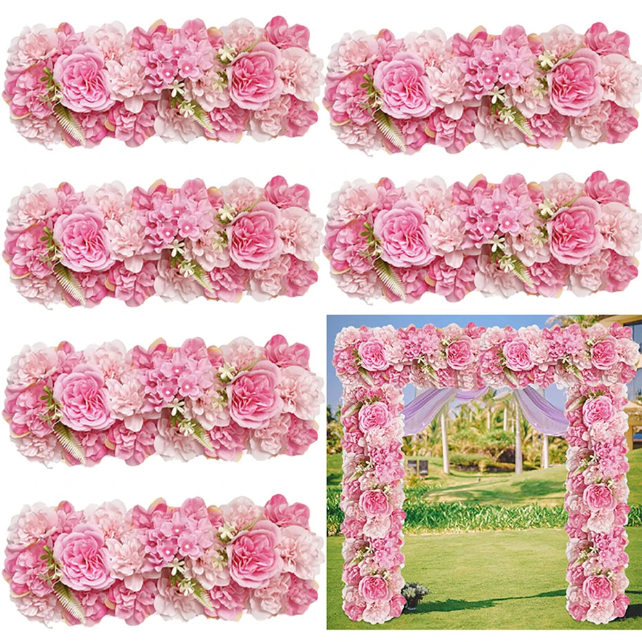A close-up display of artificial silk pink and light pink rose flower panels for weddings and events.