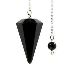 A black natural stone teardrop pendulum with a silver chain for divination and energy healing