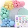A collection of pastel colored balloons arranged in an arch or garland for party decorations.