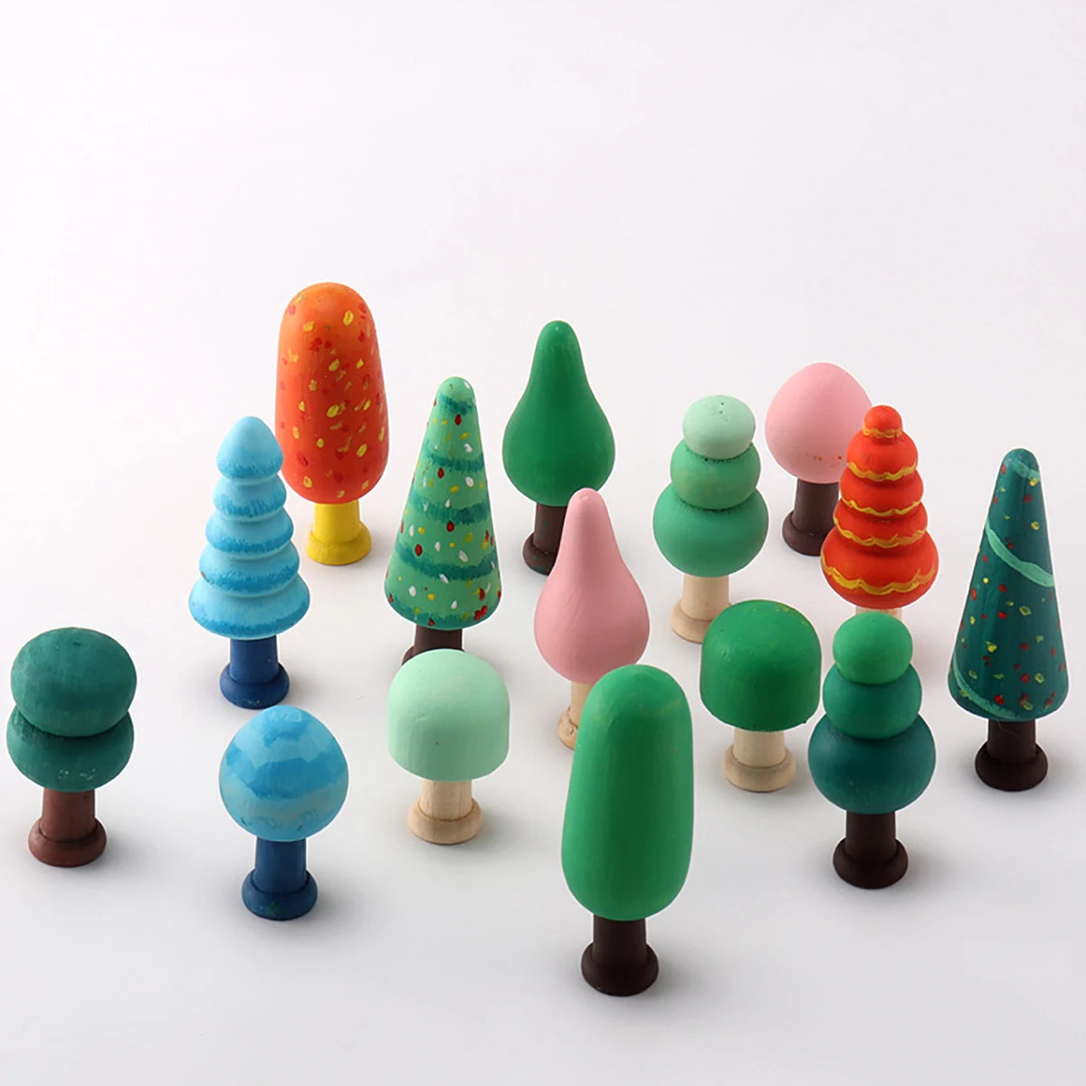 A collection of colorful wooden Christmas tree ornaments in various shapes and sizes.