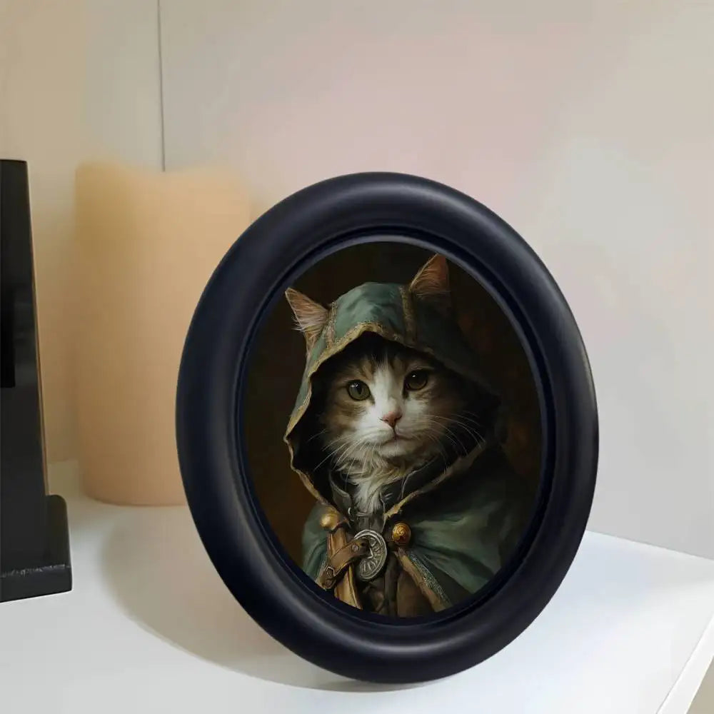 A round black photo frame featuring a Renaissance portrait of a cat wearing a hooded cloak.