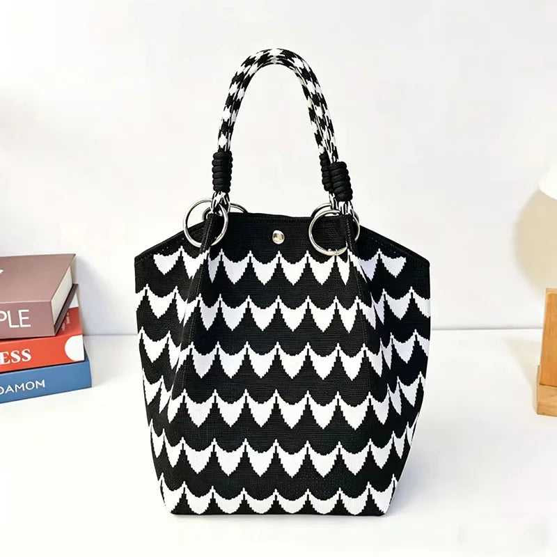 Black and white patterned jacquard knitted shoulder bag with black leather handles