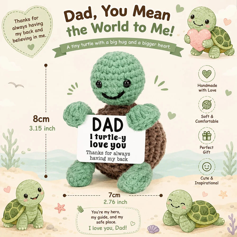 A handmade crochet turtle doll with a heart, featuring a tag that reads Dad I turtle you love you.
