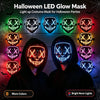 A display of various glowing LED masks for Halloween parties, including face masks and a full hooded mask.