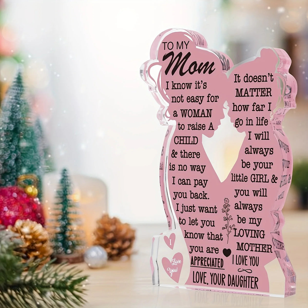 A personalized acrylic plaque shaped like a woman's silhouette with text dedicated to her mother.