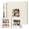 A beige linen cover scrapbook album with a gold-toned spiral binding and an inner page featuring a photo of a couple embracin