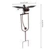 A wind spinner garden decoration featuring a bird silhouette mounted on a metal stand.