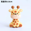 A cute, round, yellow and orange giraffe-shaped decoration for birthday parties.