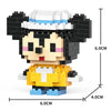 A LEGO minifigure model kit featuring a black and white animal character with a light blue hat and yellow outfit.