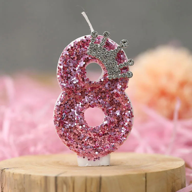 Pink sequin number eight candle with a silver crown topper