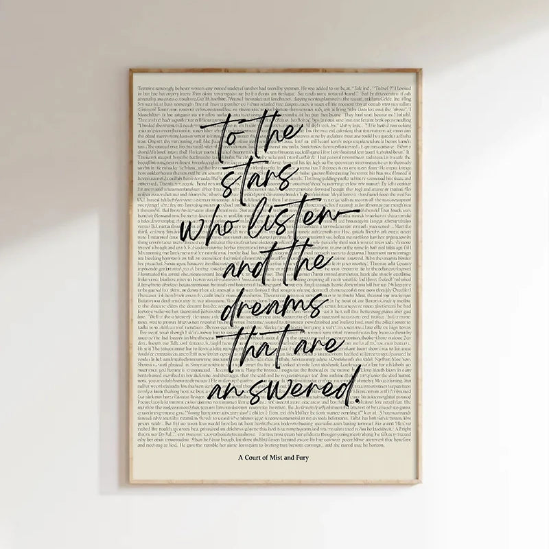 A framed piece of art featuring a quote from a book on a white background.