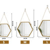 Three sizes of hexagon decorative wall mirrors labeled S M and L showing different dimensions.